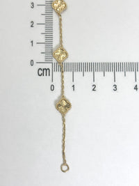Pulsera de tréboles pequeños dorados de oro 14k