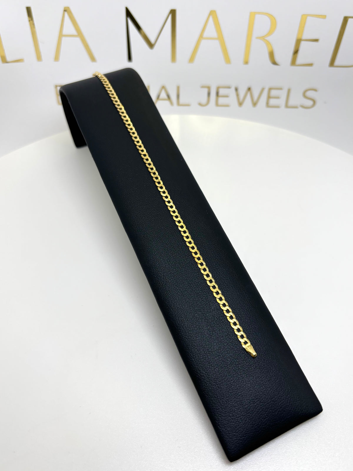 Pulsera cubana lisa de oro 14k