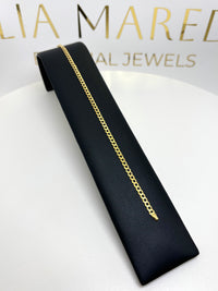 Pulsera cubana lisa de oro 14k