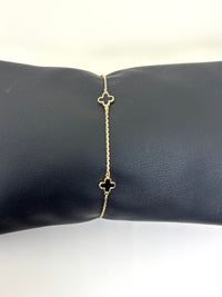 Pulsera de treboles negros de oro 14k con piedra onix para dama