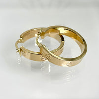 Arracadas tipo diseñador de oro 14k 2531