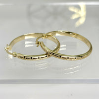 Arracadas de oro 14k con acabado de grecas Mod. 2522