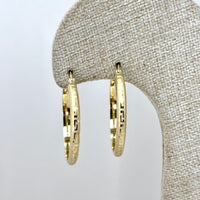 Arracadas de oro 14k con acabado de grecas Mod. 2522