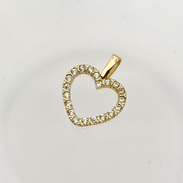 Dije de silueta de corazón de oro 14k con incrustaciones de circonias Mod. 1711
