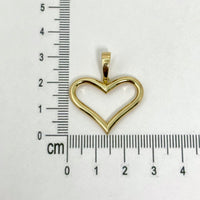 Dije de silueta de corazón liso de oro 14k
