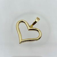 Dije de silueta de corazón liso de oro 14k