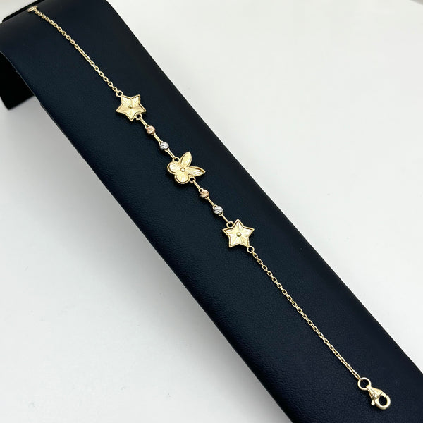 Pulsera de mariposa y estrellas en oro 14K
