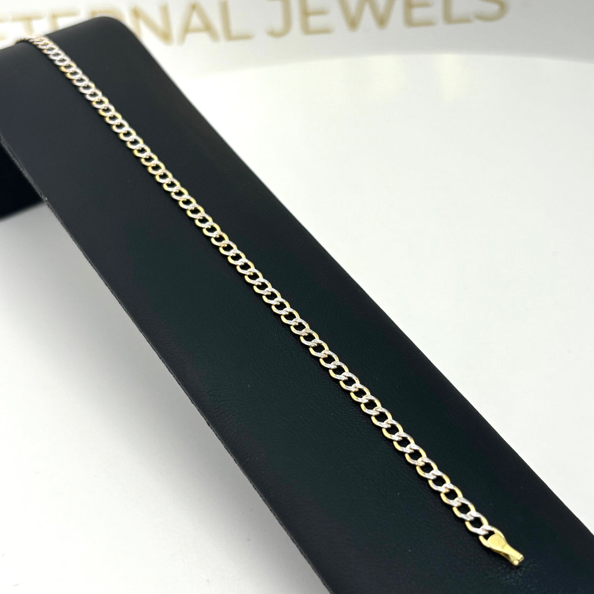 Pulsera tejido cubana delgado con un acabado diamantado de oro 14k para caballero
