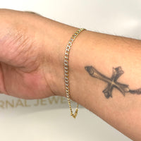 Pulsera tejido cubana delgado con un acabado diamantado de oro 14k para caballero