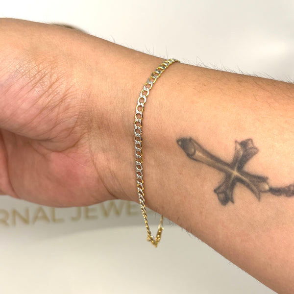 Pulsera tejido cubana delgado con un acabado diamantado de oro 14k para caballero