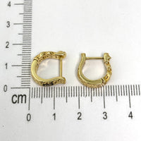 Aretes de diseñador tipo biselado