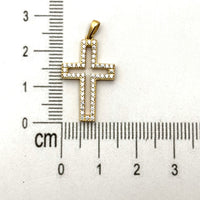 Dije de silueta de cruz con circonias unisex