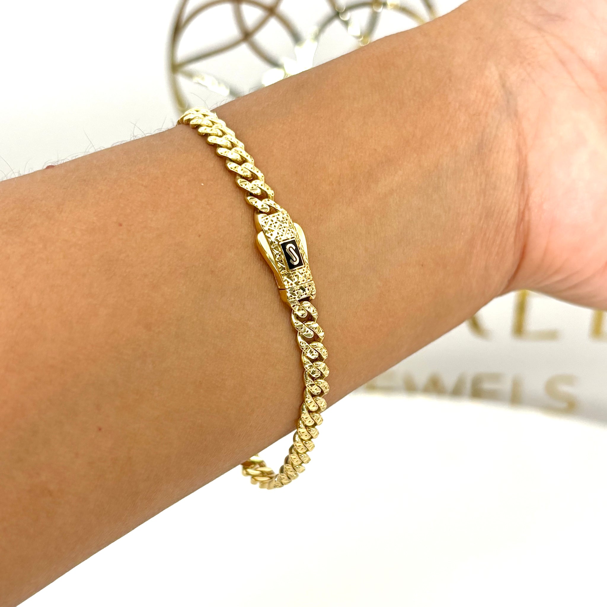 Pulsera de diseñador cubana con acabado biselado