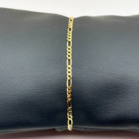 Pulsera 3x1 solida de oro amarillo calibre 2
