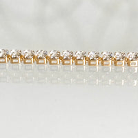 Pulsera tipo tenis en oro amarillo