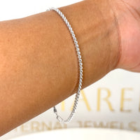 Pulsera tipo tenis en oro blanco