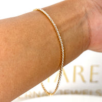 Pulsera tipo tenis en oro amarillo