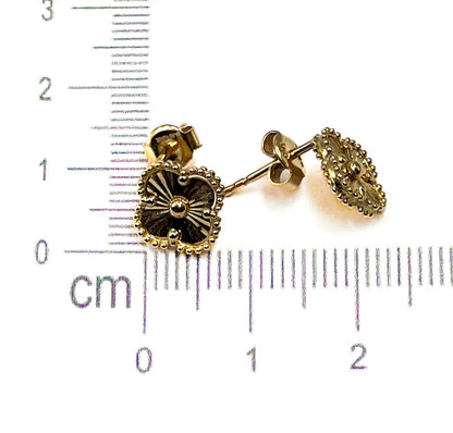 Aretes de flor doradas