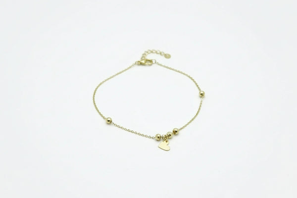 Pulsera de corazón con bolitas 14k