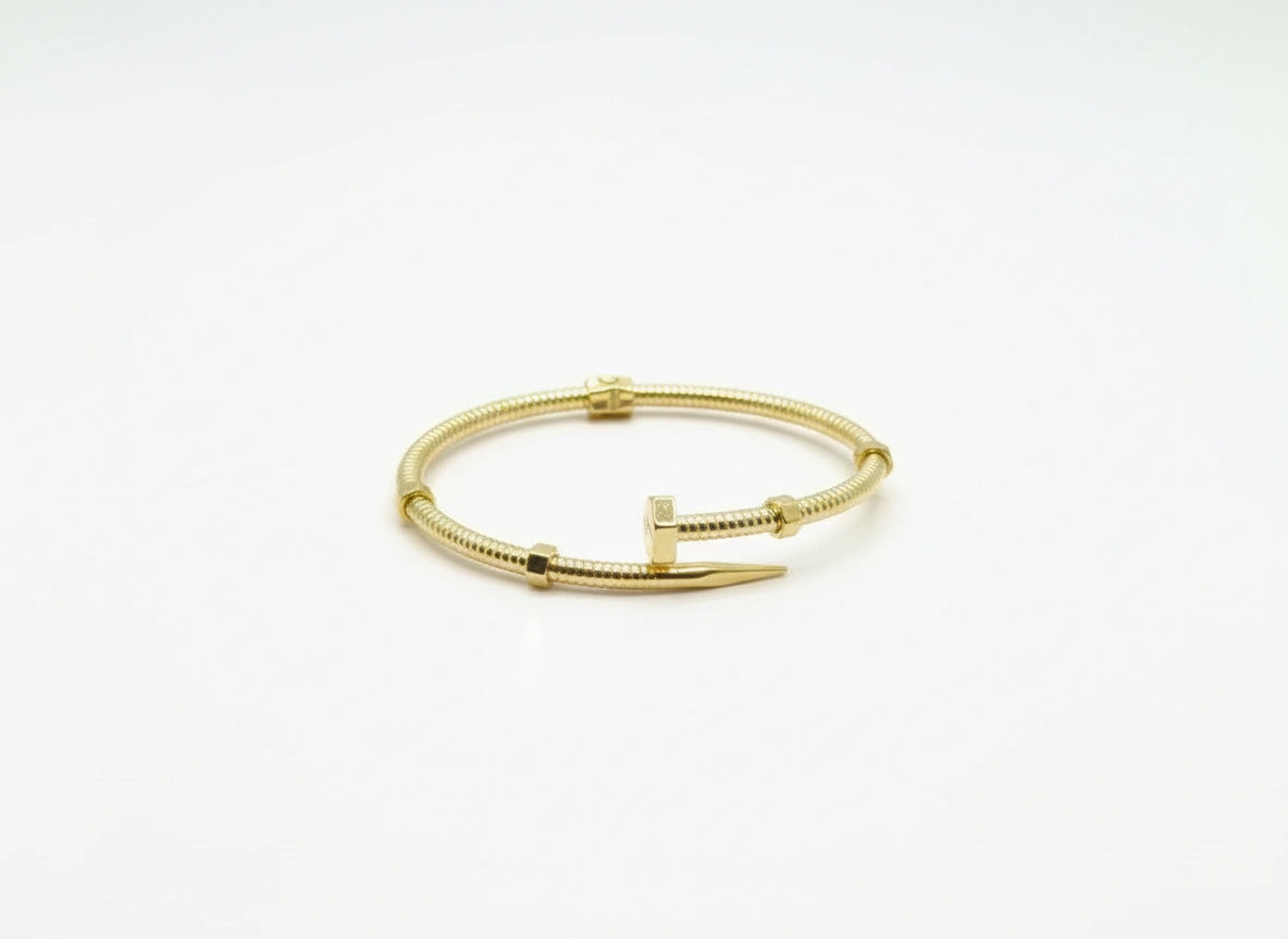 Aro de clavo con turcas de oro 14k