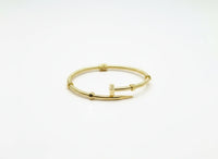 Aro de clavo con turcas de oro 14k