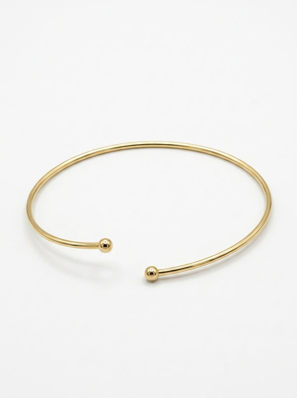 Brazalete de oro 14k abierto con esferas en los extremos Mod 5990 - 18 cm