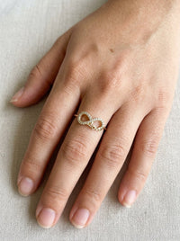 Anillo de oro 14k infinito con circonias y palabra Love Mod 6068
