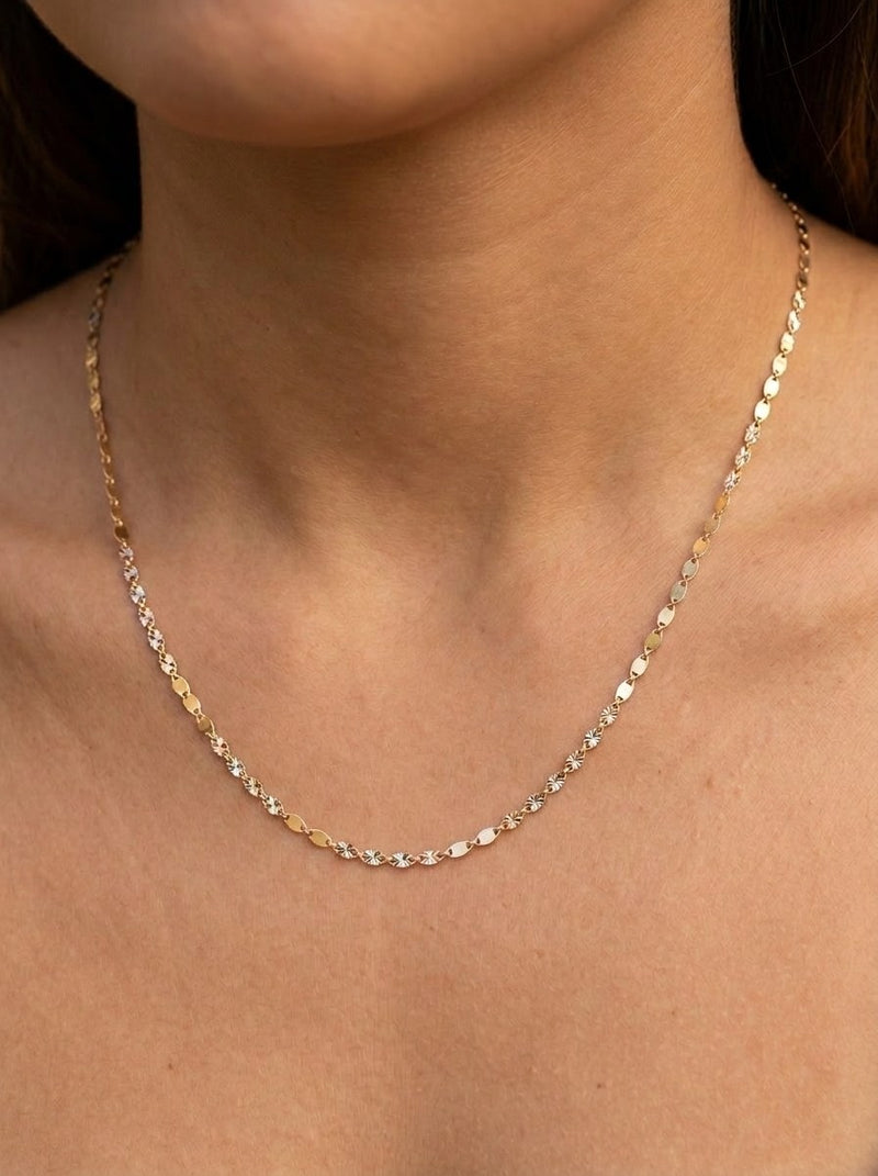 Cadena de oro 14k tejido Valentino semilla con estrella diamantada en tres tonos Mod 6105 - 2 mm