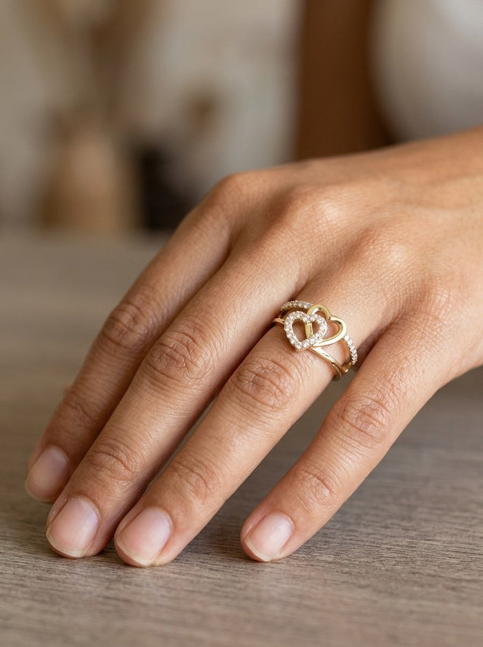 Anillo de oro 14k con corazones entrelazados y circonias Mod 6106