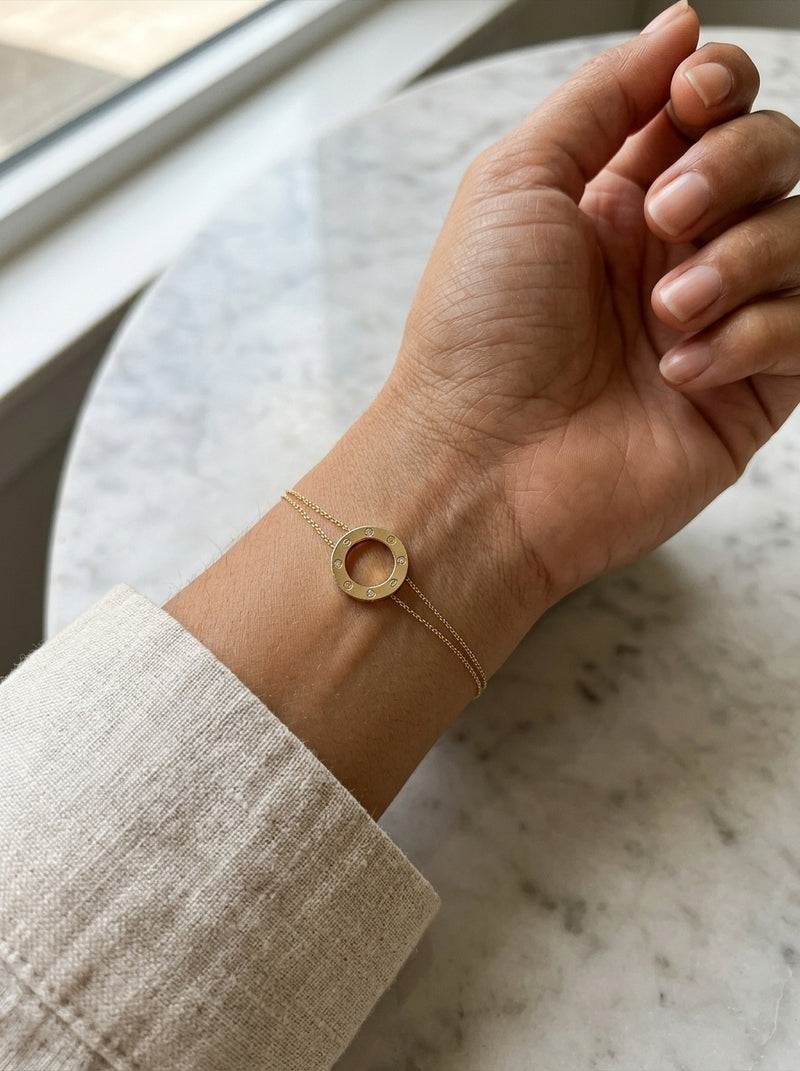 Pulsera de oro 14k tipo diseñador con círculo mediano de tornillos y circonias Mod 6113 - 18 cm