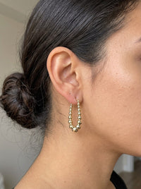 Arracadas de oro 14k de bolitas diamantadas graduadas Mod 6277
