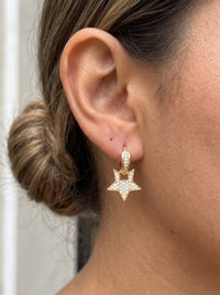 Huggies de oro 14k con estrella de circonias Mod 6331