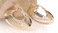 Arracadas de oro 14k de media luna calada Mod 6334 - 3 cm, foto real