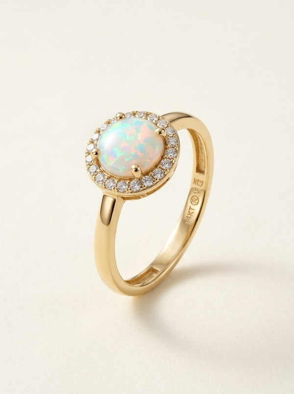 Anillo de oro 14k con ópalo redondo y halo de circonias Mod 6356